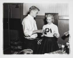 Two Petaluma high school students sharing a Coke, Petaluma, California, about 1953