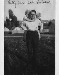 Cousins Esley "Bobby" Anne and Brainerd Evans and a man named Bob, Petaluma, California, about 1924