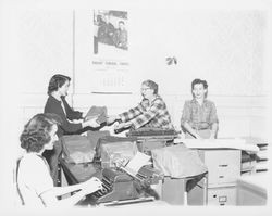 Packing up office equipment at City Hall, Petaluma, California, 1954