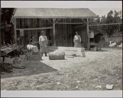 E. W. M. Evans working at monument yard, Petaluma, California, about 1900