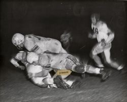 Tackling during Petaluma Leghorn game with Camp Cooke