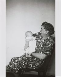 Dagny Juell holding her goddaughter, Bonnie Alwes, Santa Rosa, California, 1946