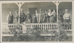 Family portrait of the Borba family on a porch