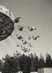 Carnival goers fly through the sky at the Sonoma County Fair, Santa Rosa, California