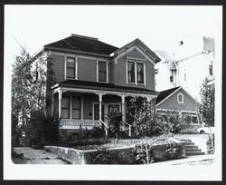 Stick Style house with truncated hip roof