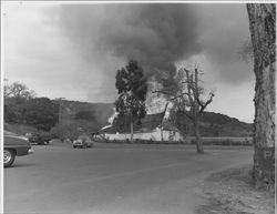 Barn at the Petaluma Adobe engulfed in flames, about 1955