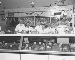 Pacific Market employees at work in Petaluma, California, December 30, 1954