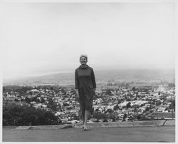 Helen Putnam on a hill overlooking city of Petaluma, California, 1967