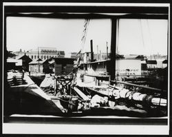 Petaluma wharf with the steamship Weithpec of Eureka at the dock and stacked feed bags, Petaluma, California, 1897?