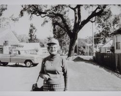 Josephine M. Morse walks by the construction site of the Cloverdale Regional Library, Cloverdale, California, 1978