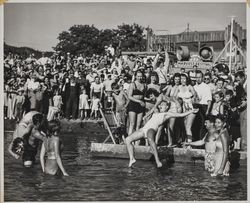 Lillian Paige being thrown into the water at the Healdsburg Harvest Festival, Healdsburg, California, 1946