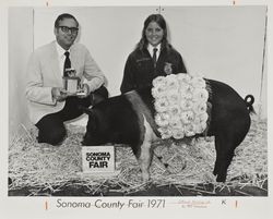 Claire Thompson and her Champion hog at the Sonoma County Fair, Santa Rosa, California, 1971