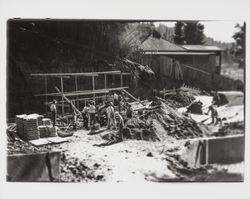 Workers building retaining wall forms on the site of reconstruction of St. Elizabeth's, Guerneville, California, 1935