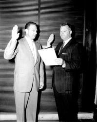 County Clerk Gene Williams swearing in Don Head