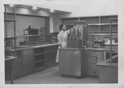 Dietitian Aeitko Fukui examines the kitchen at the new Hillcrest Hospital, Petaluma, California, December, 1956