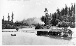 Russian River, California view of boaters and a boathouse