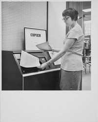 Joan Seim at the library photocopier