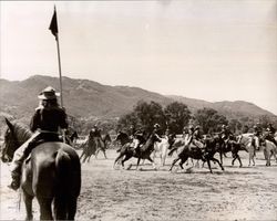 Members of the California Centaurs mounted junior drill team riding in formation at the Boyes Hot Springs Horse Show in 1946