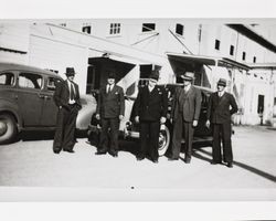 Petaluma Cooperative Creamery Board of Directors and manager, George Dondero, standing outside the plant, about 1942