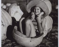 Ethel Ramatici Matteri sitting in a pumpkin, Petaluma, California, 1937