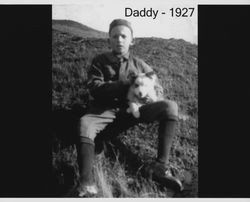 Russell Nissen with a puppy, 1927