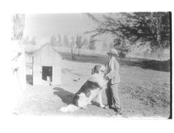 Charles Denman with his dog, Petaluma, California, 1910