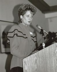 Marsha Heck at the podium, Santa Rosa, California, in the 1990s