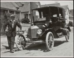 Merton Stewart and his taxi, Post Street and Bassett Street, Petaluma, California, about 1910