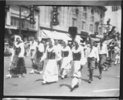 Marching units of women and girls in the Rose Parade