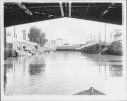 Looking down the river toward McNear warehouse, Petaluma, California, 1952