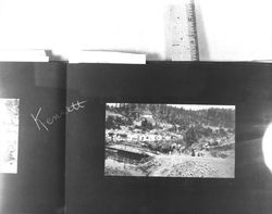 Jack and Charmian London crossing the bridge in Kennett, California, 1911