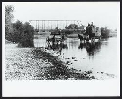 Soaking wagon wheels in the Russian River by the steel bridge, Cloverdale, California, 1885