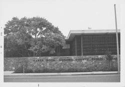 Library's basalt wall before and after erection of the Library sign