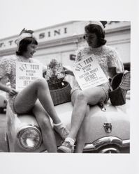 Two women promoting a butter and egg event, Petaluma, California, 1947