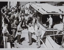 Group on passengers aboard the yacht "Tizmyne" on the Petaluma River, Petaluma, California, 1950s