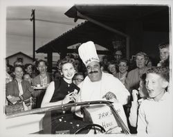 Sandra Duden and Chef Cardini at opening of Valley Mart, Sonoma, California, 1958