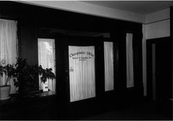 Interior of the John C. "Hoke" Smith House at 714 Mendocino Avenue, Santa Rosa, California, showing chiropractic office door, May 12, 1996