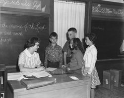 Unidentified students with a teacher at St. Vincent's School, Petaluma, California, 1963