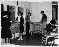 Students using the Saint Vincent de Paul High School (Petaluma, California) library, about 1964