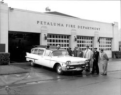 Examining the new Petaluma Fire Department ambulance, Petaluma, California, about 1958