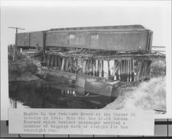 Railroad engine in Petaluma River at Bridge/Hopper Street trestle, Petaluma, California, 1941