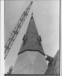 Raising the steeple of Church of One Tree at its Juliliard Park (Santa Rosa, California) location