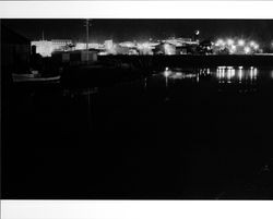 Nighttime view of the Petaluma Turning Basin, Main Street and Washington Street