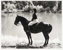 Charmian London on horseback