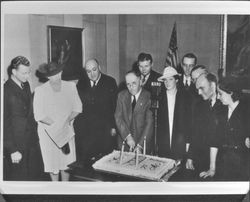 Ernest Finley cutting KSRO's birthday cake, Santa Rosa, California, about 1940