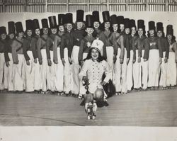 Group photograph of Petaluma Junior High Girls Club performing the March of the Wooden Soldiers on roller skates, 201 Fair Street, Petaluma, California, about 1946