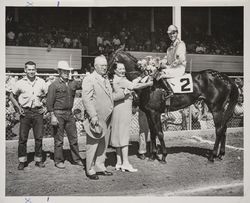 Mrs. Florence Meese crowning the winner of the Healdsburg Handicap, Who Else, at the Santa Rosa Fairgrounds, July 25, 1955
