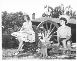 Girls posing around the Petaluma Adobe prior to the Old Adobe Fiesta, Petaluma, California, 1964