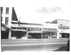 Ott's Stationary, U.S. Bakery, and other shops, Petaluma, California, 1957