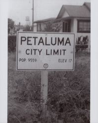 Petaluma city limit sign, Lakeville and East Court, looking north, Petaluma, California, 1951